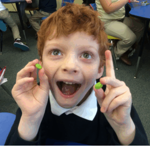 A child playing with craft items